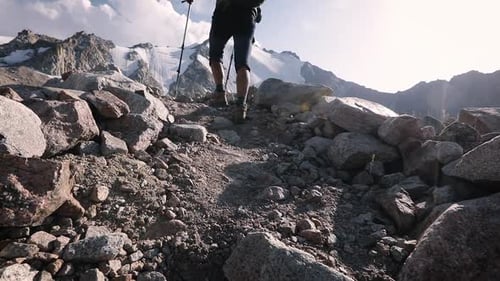 Hiker Tourist with Backpack at Mountain Valley