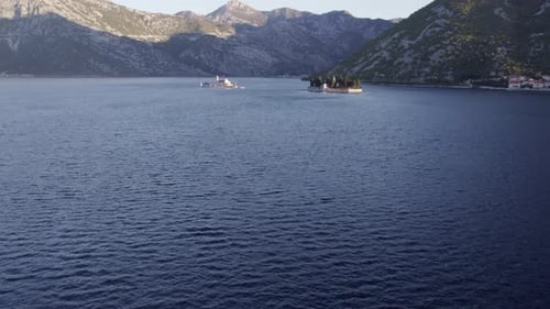 Aerial view of church overlooking Kotor Bay at sunrise, Montenegro.
