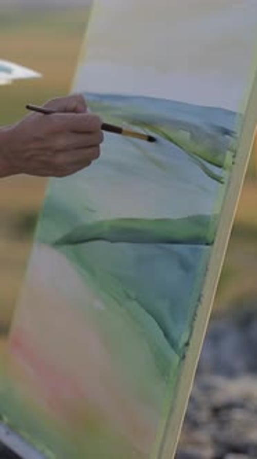 The Artist Paints a Picture with Oil Paints Closeup Vertical Video