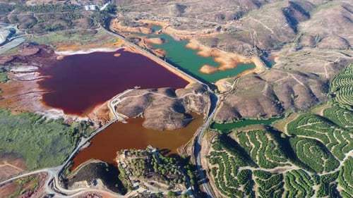 Aerial drone view of Mining activity in Minas de Riotinto in Spain. Polluted water and lakes.