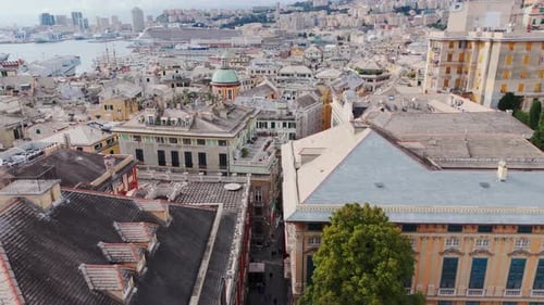 Genoa's historic center with ancient buildings and scenic coastal surroundings, aerial view