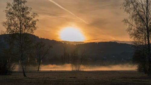 Sunrise Over Misty Mountain Landscape