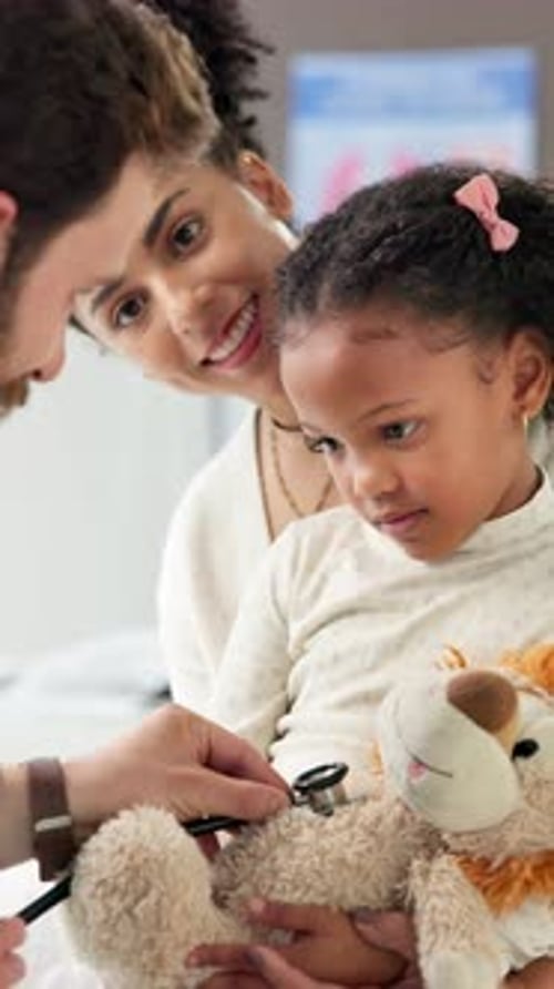 Stuffed animal, stethoscope and pediatrician with child in hospital for asthma