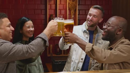 Friends Hanging out in Bar and Giving Toast While Celebrating