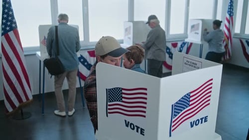 Father with Child Voting in Polling Station
