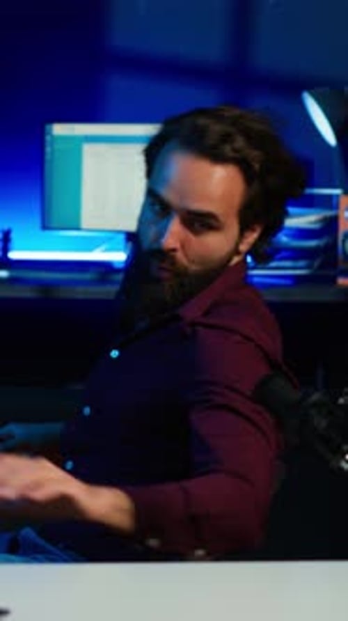 Vertical Video Childish Man Doing Creative Intro for Vlog Spinning on Chair While Filming