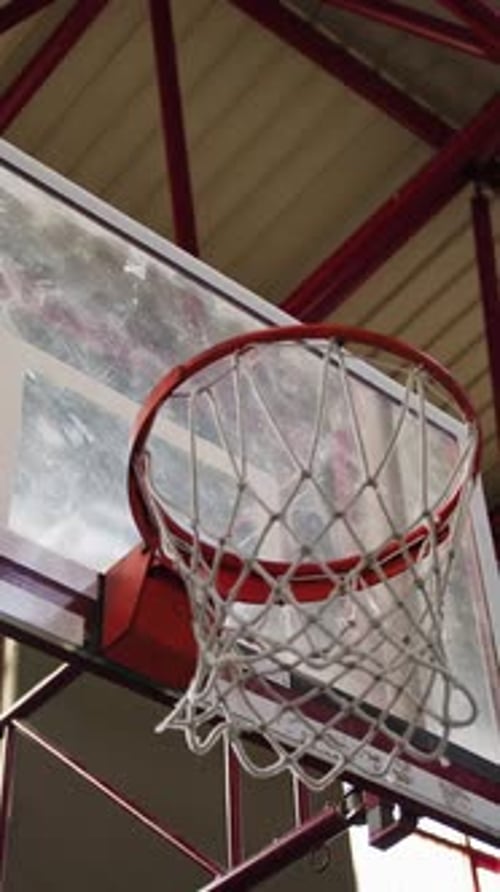 Shooting Basket Detail In An Indoor Court