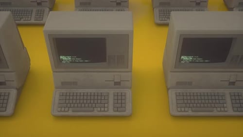 Seamless Loop Animation of Vintage Computers With Green Code on Screens