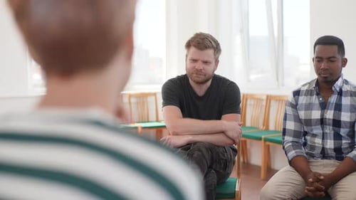 Men in Group Therapy Session Indoors