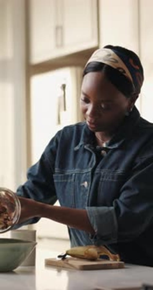 Woman Prepares Healthy Vegan Breakfast Food in Kitchen