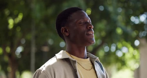 Man, relax and breathing outdoor for fresh air, mindfulness and stress management on college campus