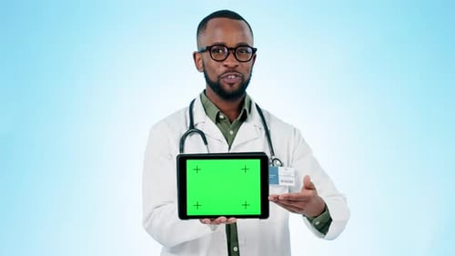Black man, doctor and tablet green screen in healthcare advertising or marketing against a studio