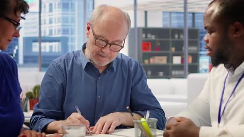 Business Meeting and Signing of Documents in Office
