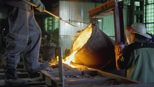 Molten Metal Pouring in Foundry Workshop