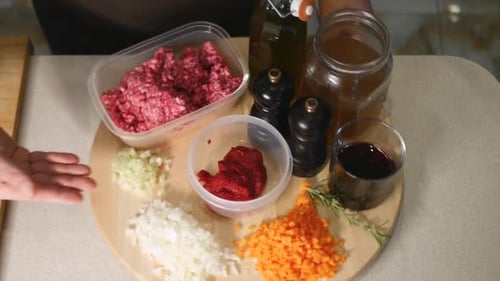 Wheel of ingredients to make a classic Pasta alla Bolognese