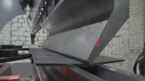 metal bending machine. metal bent. bending of metal. metal crafting
