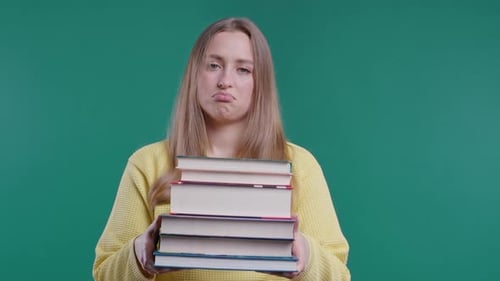 Lazy Schoolgirl or Student is Dissatisfied with Amount of Books Homework on Blue
