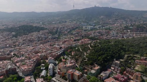 Aerial Panoramic Footage of Hilly La Salut Quarter with Park Guell Residential Urban Boroughs and TV