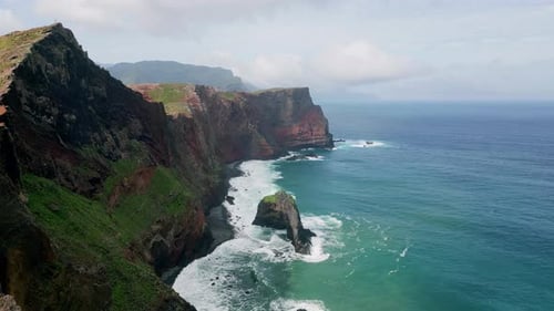 Foaming Water Splashing Cliffs on Sunny Summer Day Drone Breathtaking Ocean