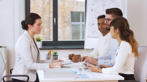 Business Meeting in Bright Office with Diverse Team