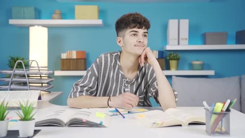 Student takes notes on small papers.