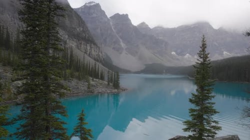 Mountains peaks reflect in Moraine Lake