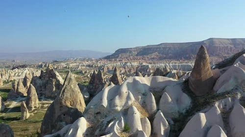 Cappadocia landscape with fairy chimney rock formations, forward aerial