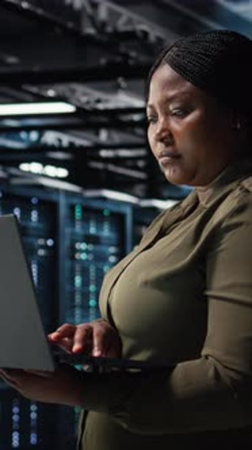 Vertical Video Software Developer in Data Center Using Laptop to Upgrade Systems