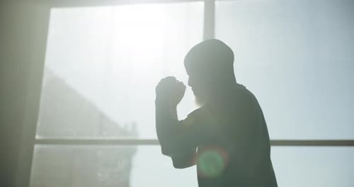 Boxing, fitness and punch with black man in gym for sparring practice, workout or mma
