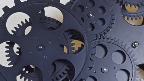 Interlocking Gears Rotating in Machine Mechanism