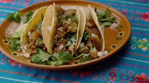 Tacos al pastor on a plate close up