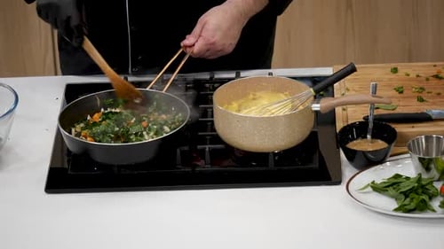 Chef Cooking Food on Stove Top