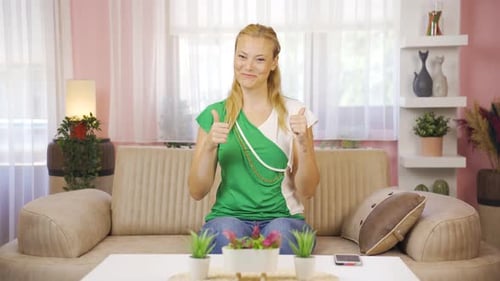 Smiling Woman Giving Positive Hand Gestures