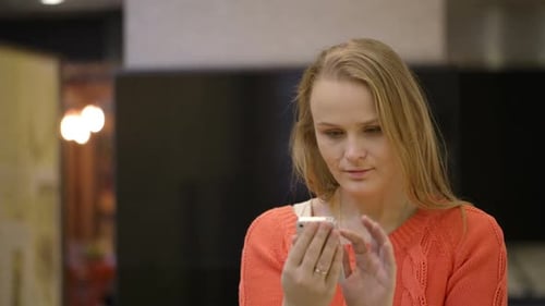 Young woman using smartphone