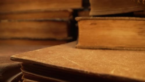 Macro View of Saved Medieval Books with Ancient Writings Religious Literature Archival Manuscripts