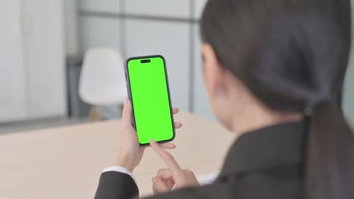 Businesswoman Using Smartphone with Chroma Key Green Screen