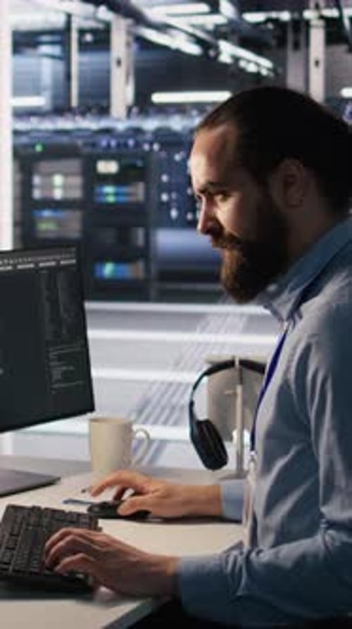 Vertical Video Overworked Technician in Data Center Managing AI Server Infrastructure