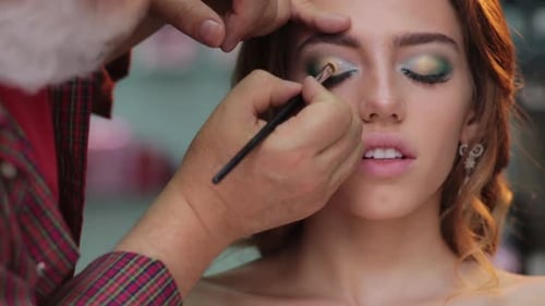 Makeup Artist Applying Eyeshadow for Beauty Makeup Model Closeup Eyes Eyeshadow Beautiful Young