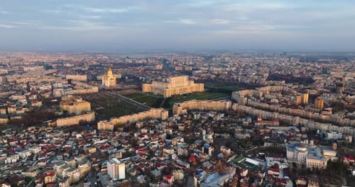 Aerial drone view of Palace of the Parliament in Bucharest downtown at sunset. Romania