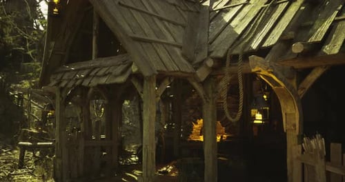 Rustic Cabin in a Forest with Warm Lighting and Natural Surroundings