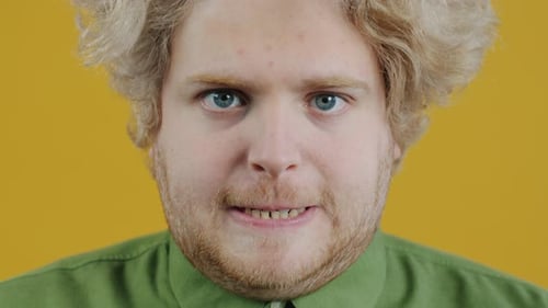 Young Adult Shows Anger and Frustration Close Up