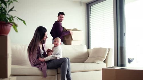 Young family moving into a new home