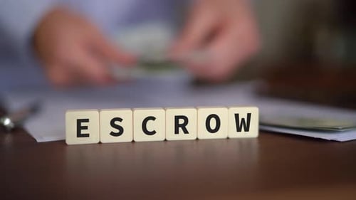 Escrow Concept with Man Counting Money in Background