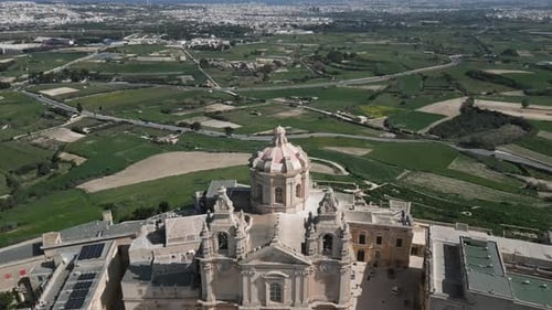 Aerial video of the walled city of St Paul's Cathedral, Malta