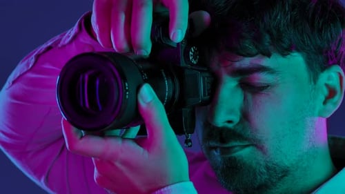 Backstage Photographer in Studio Shooting with Camera