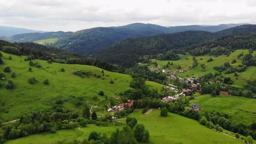 Serene Wierchomla village in Beskid Sadecki mountains, Poland, aerial panorama