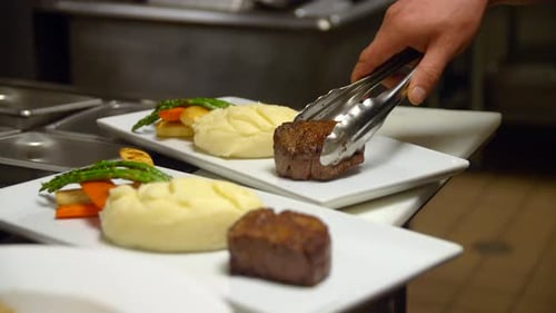 Restaurant Food Preparation: Plating Beef Filet with Vegetables