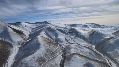 Snowy Mountain Range Aerial View