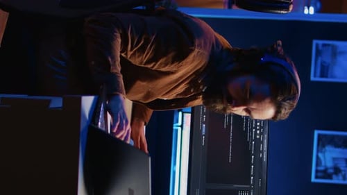 Frenzied Programmer Impatiently Taping Desk with Fingers While Writing Code