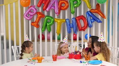 Birthday Celebration with Children and Colorful Decorations